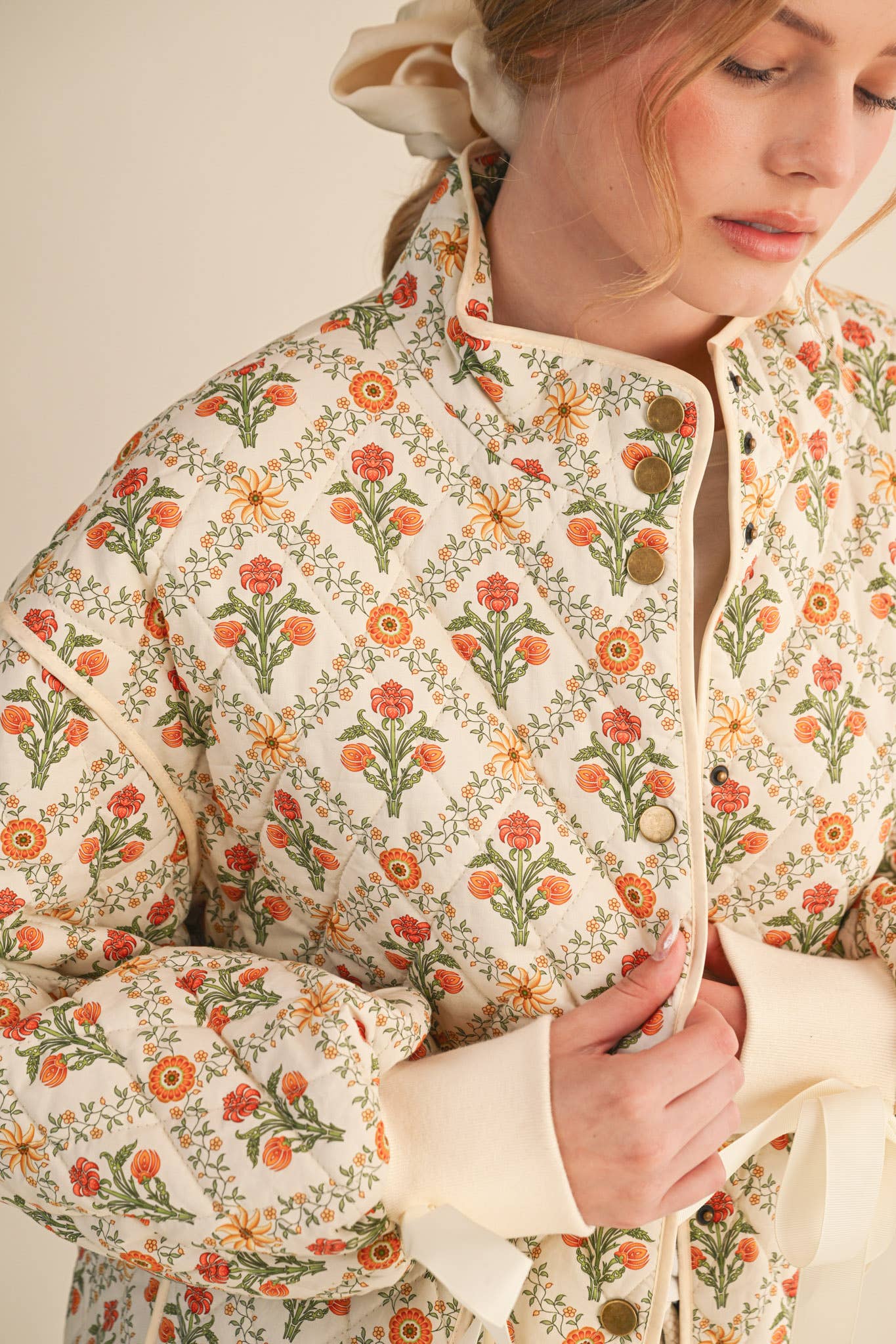 FLORAL QUILTED JACKET WITH RIBBON DETAIL