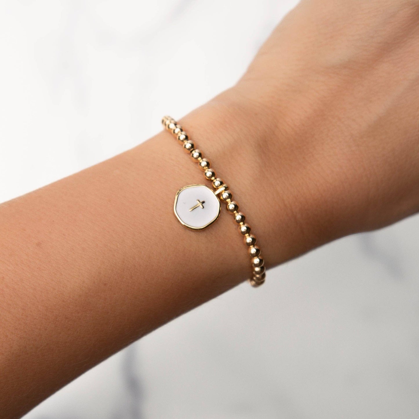 Faith Over Fear Gold Beaded Bracelet w/ White Enamel Cross