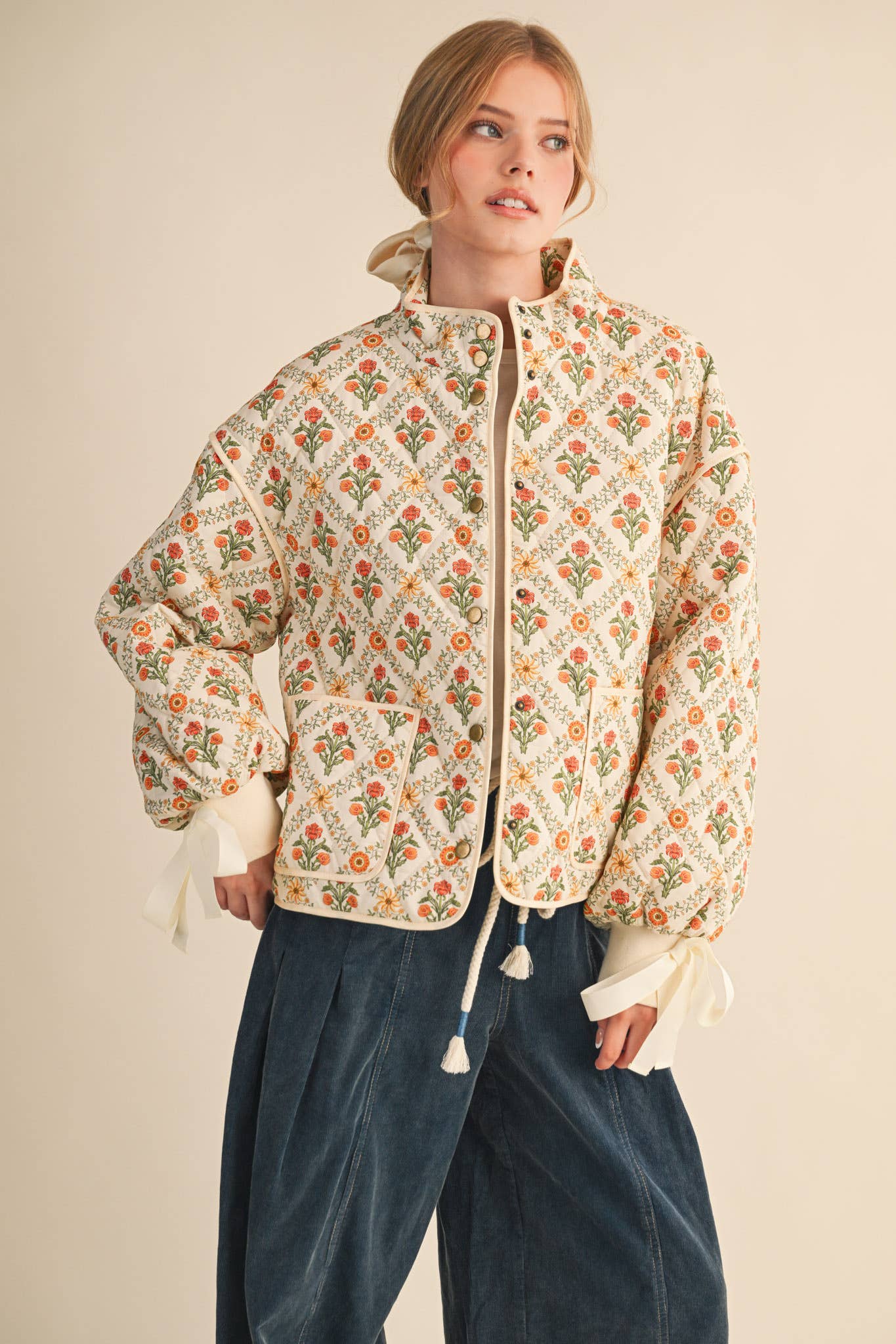 FLORAL QUILTED JACKET WITH RIBBON DETAIL