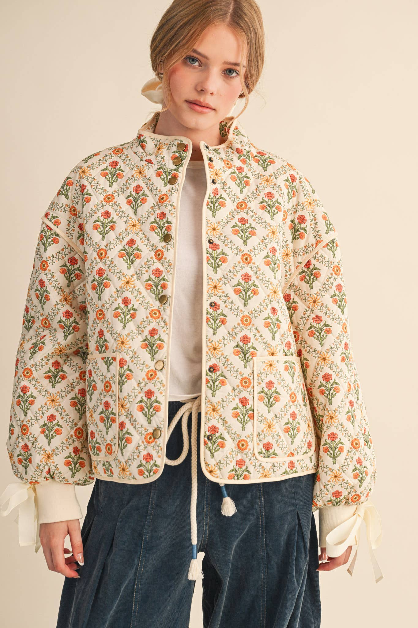 FLORAL QUILTED JACKET WITH RIBBON DETAIL