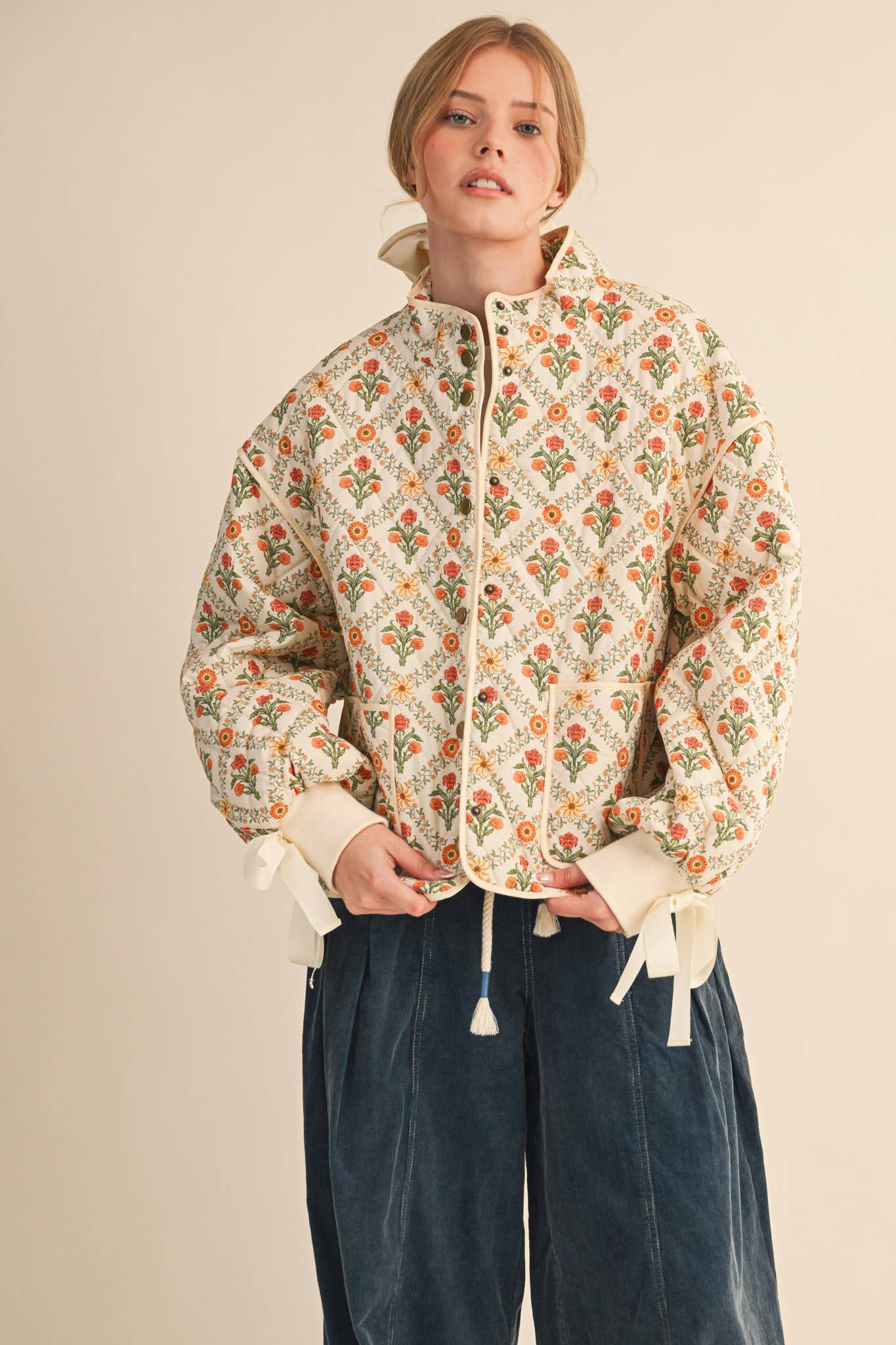 FLORAL QUILTED JACKET WITH RIBBON DETAIL
