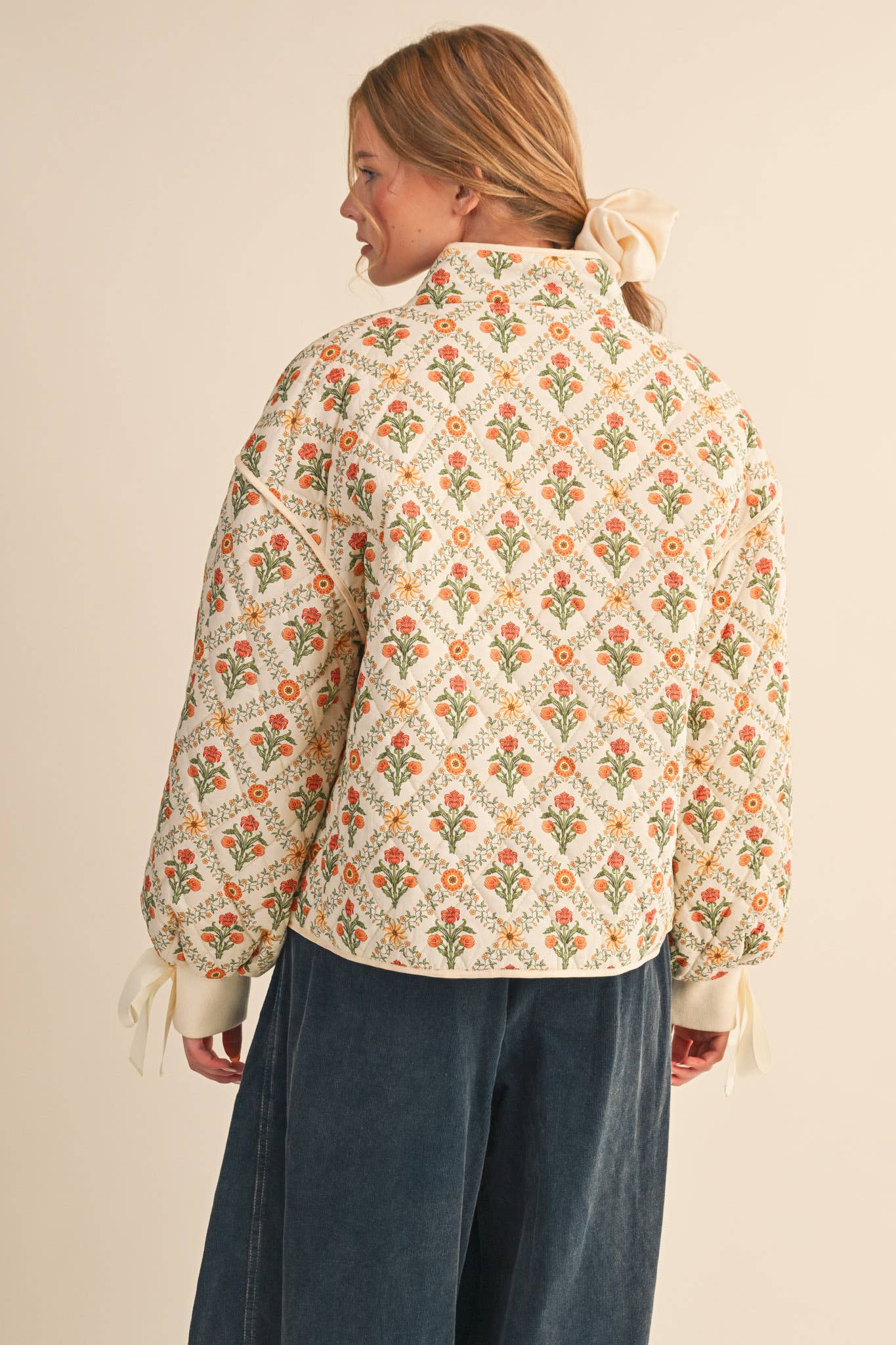 FLORAL QUILTED JACKET WITH RIBBON DETAIL