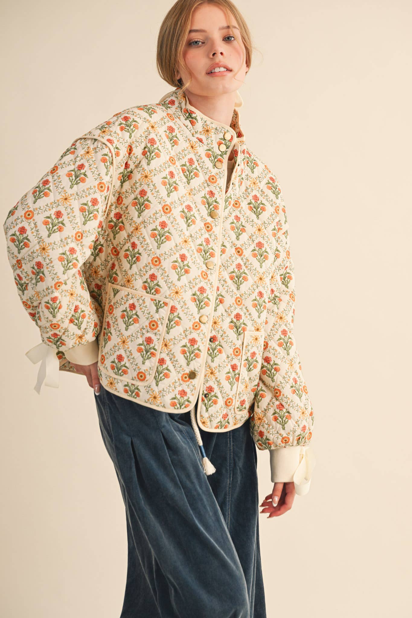 FLORAL QUILTED JACKET WITH RIBBON DETAIL