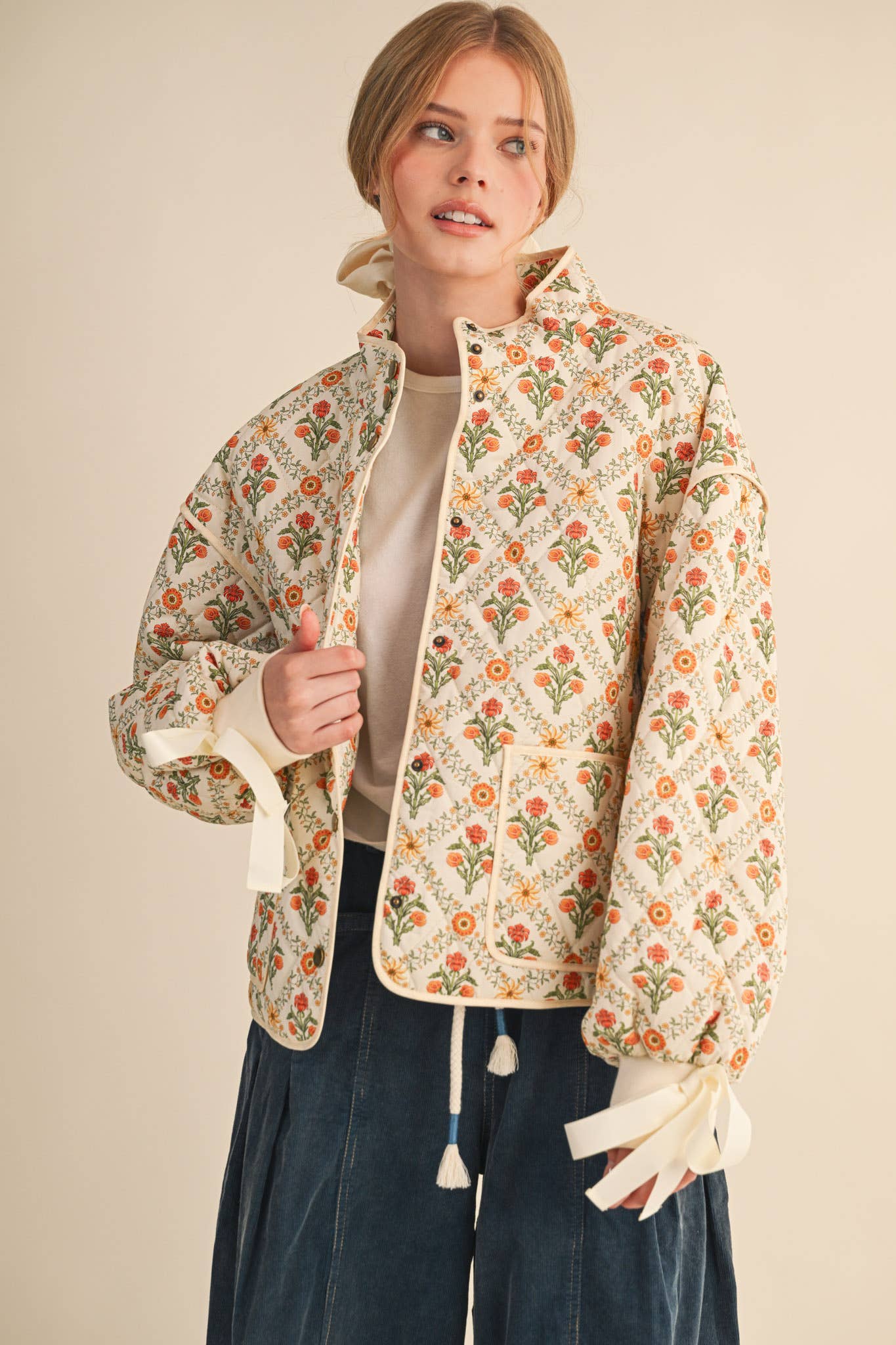 FLORAL QUILTED JACKET WITH RIBBON DETAIL