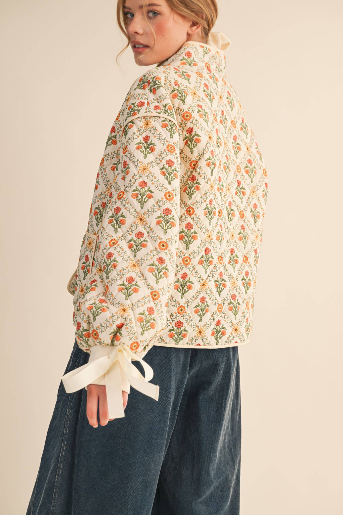 FLORAL QUILTED JACKET WITH RIBBON DETAIL