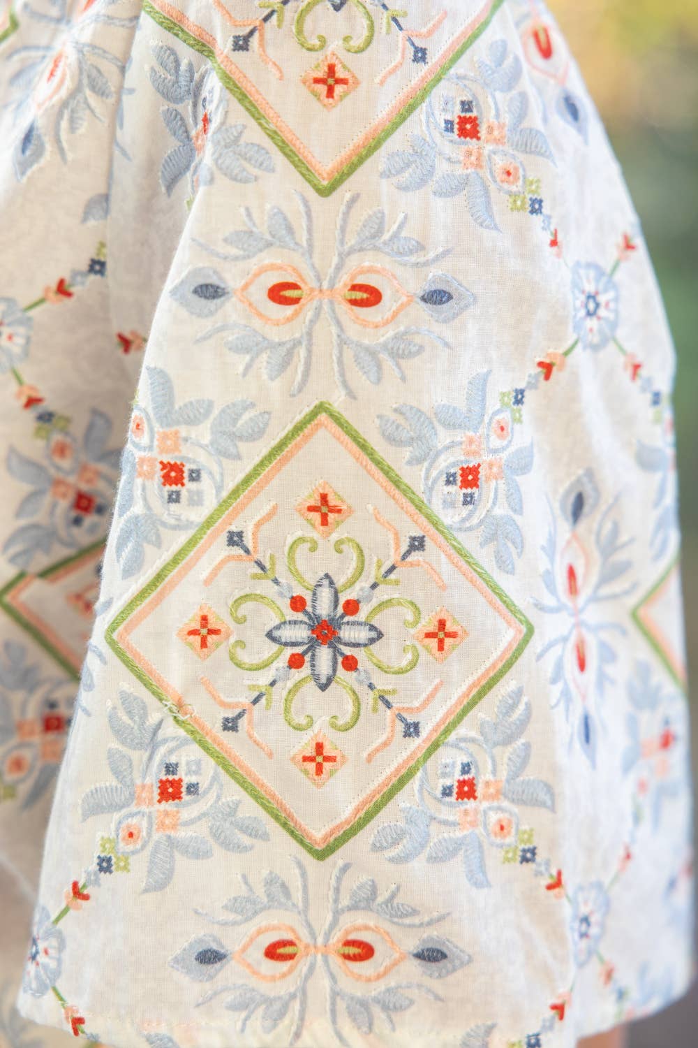 Wave Trim Striped Yoke Embroidery And Printed Top
