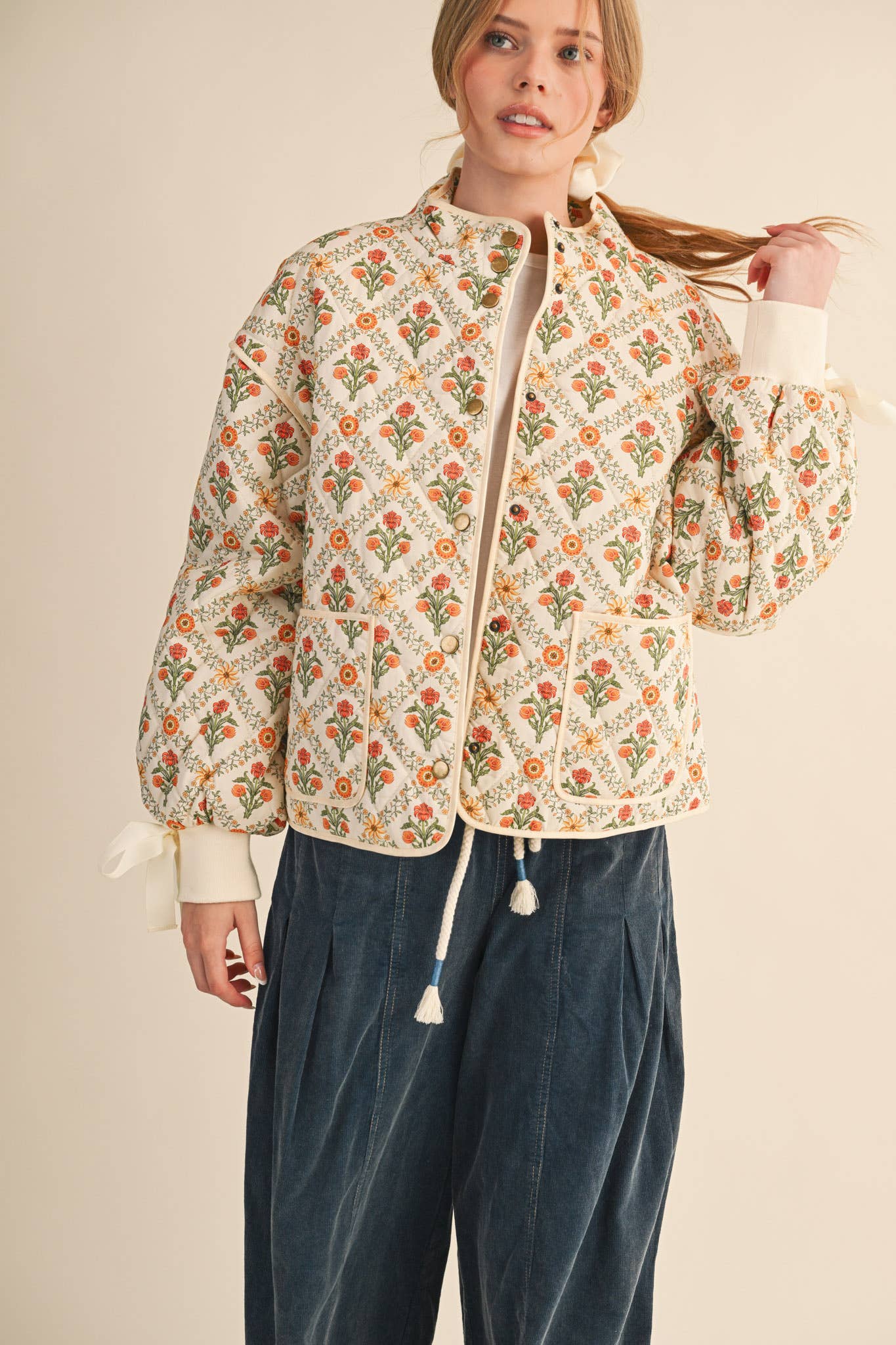 FLORAL QUILTED JACKET WITH RIBBON DETAIL