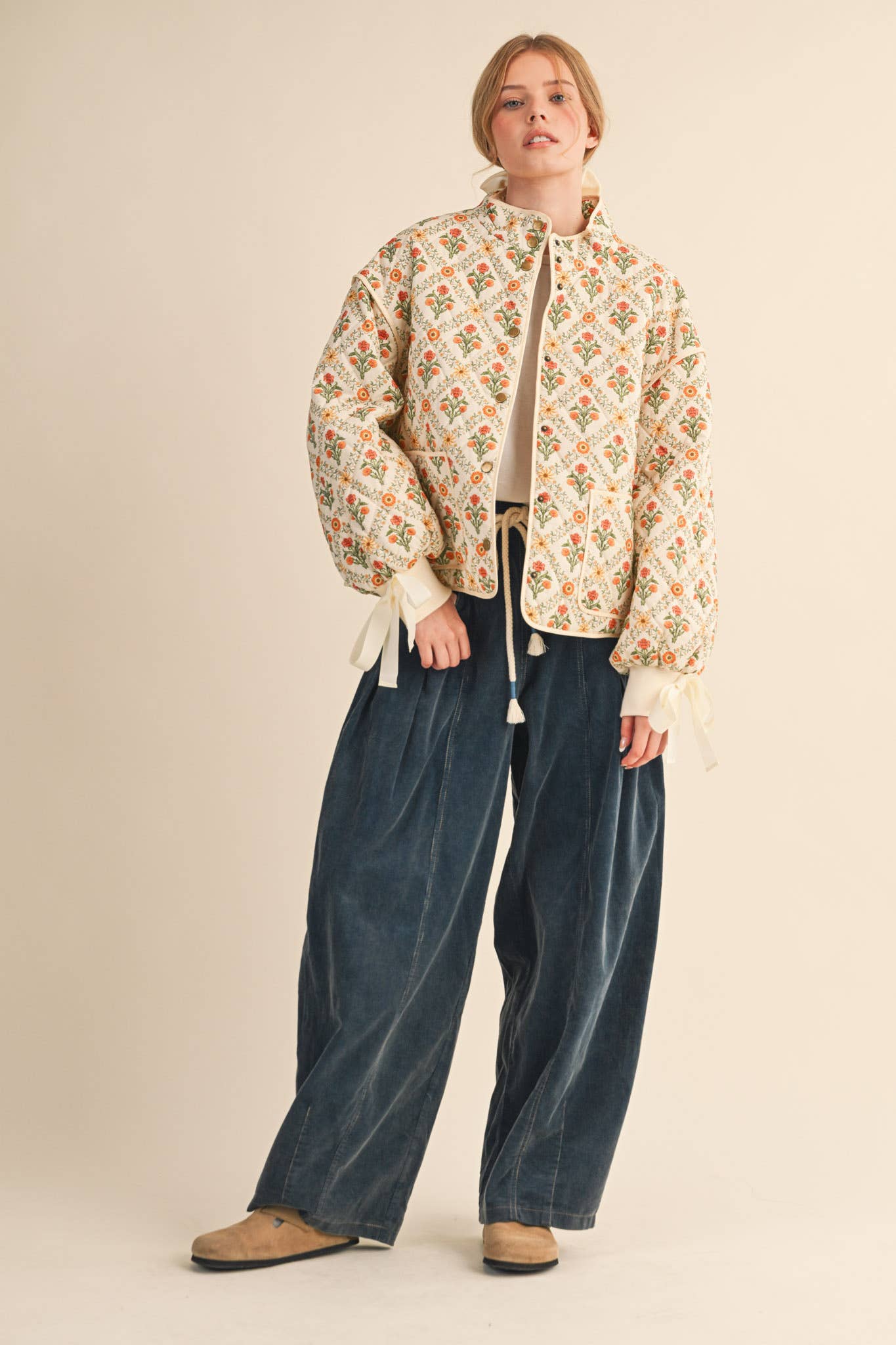 FLORAL QUILTED JACKET WITH RIBBON DETAIL
